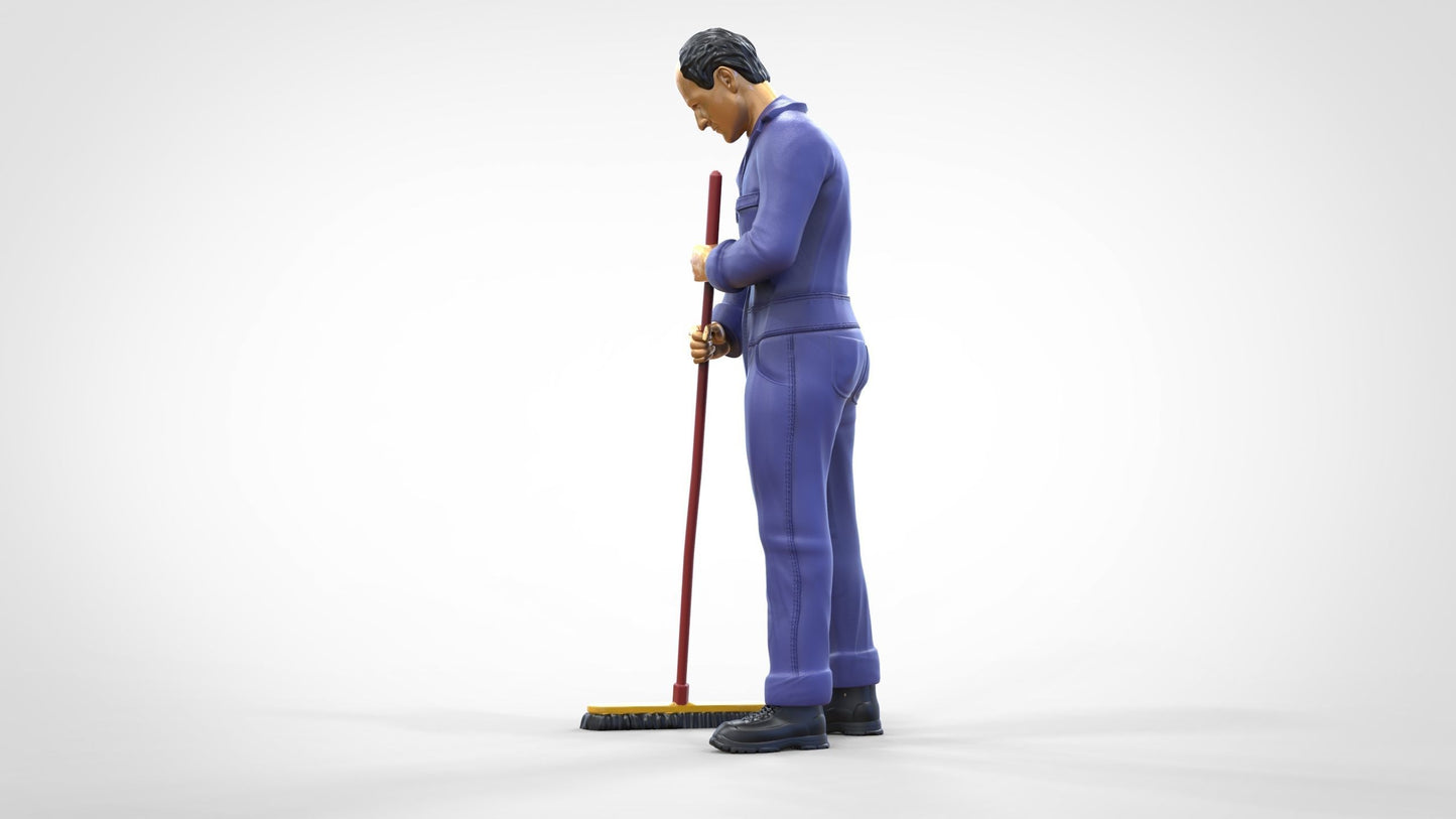 Photo du produit 0 : Gardien ou agent d'entretien : homme avec un balai en combinaison