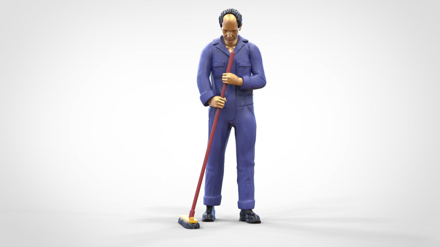 Photo du produit 0 : Gardien ou agent d'entretien : homme avec un balai en combinaison