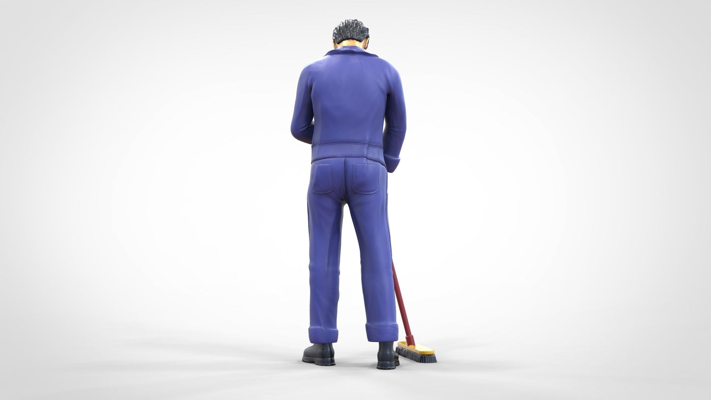 Photo du produit 0 : Gardien ou agent d'entretien : homme avec un balai en combinaison