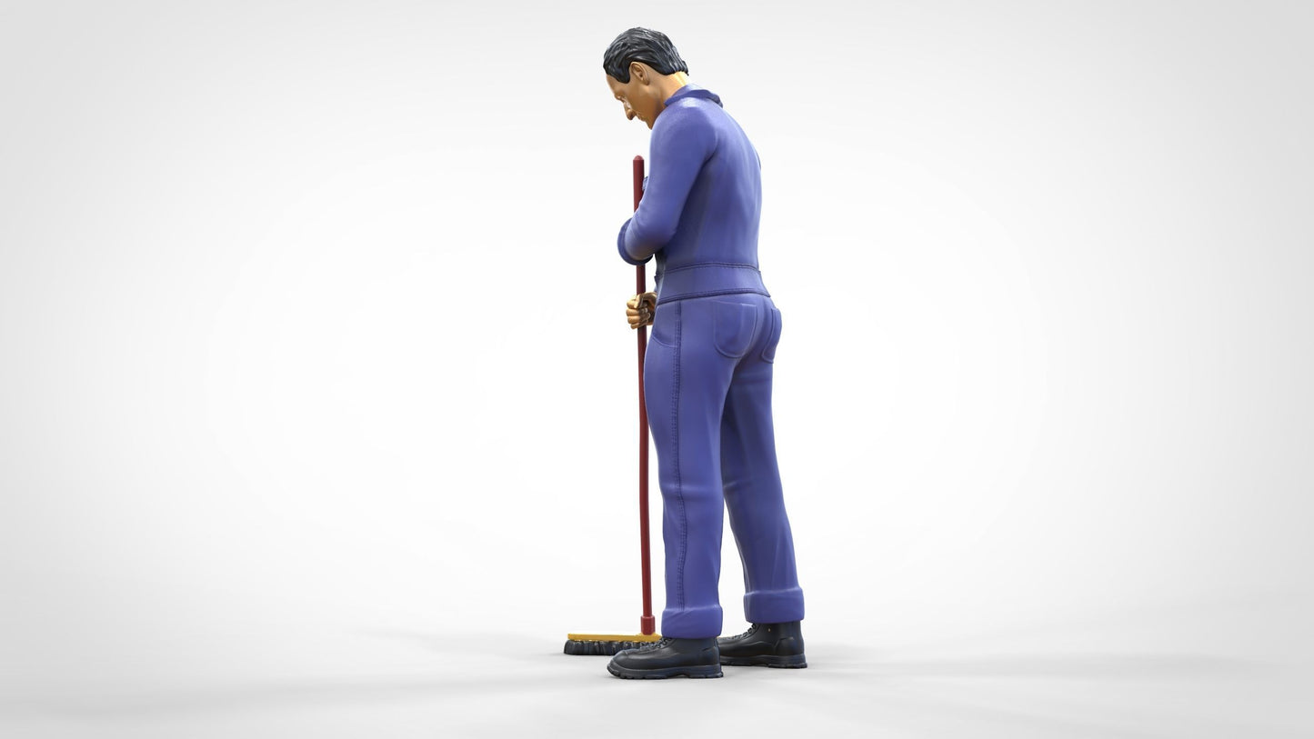 Photo du produit 0 : Gardien ou agent d'entretien : homme avec un balai en combinaison