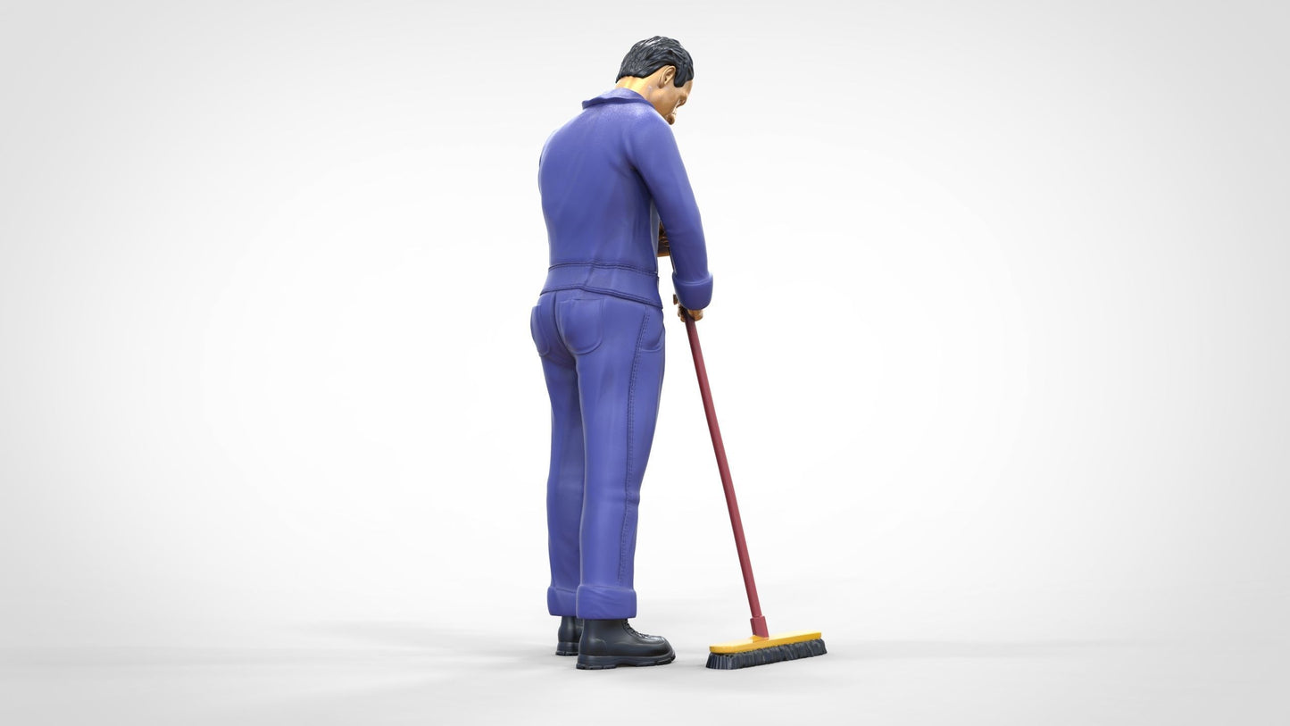 Photo du produit 0 : Gardien ou agent d'entretien : homme avec un balai en combinaison