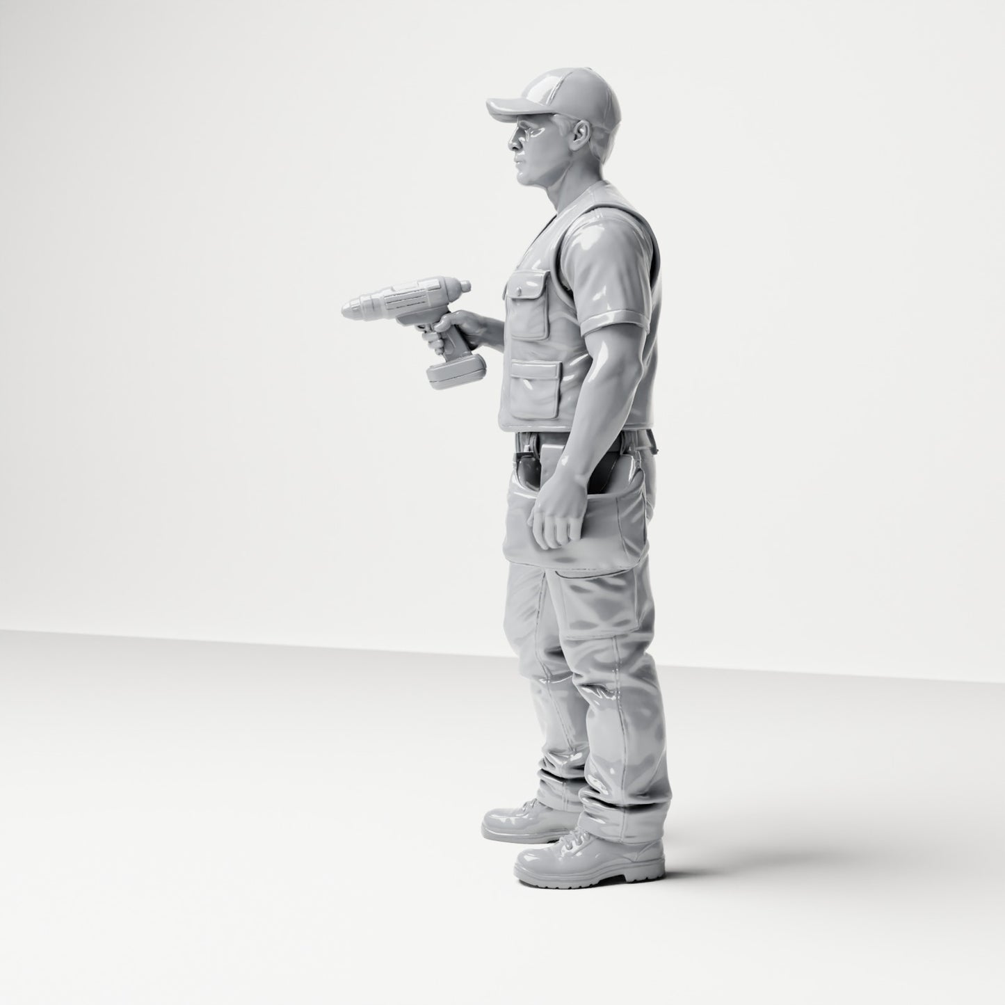 Photo produit de diorama/modélisme 1 : figurine debout : artisan avec sacoche à outils et visseuse sans fil (B046)