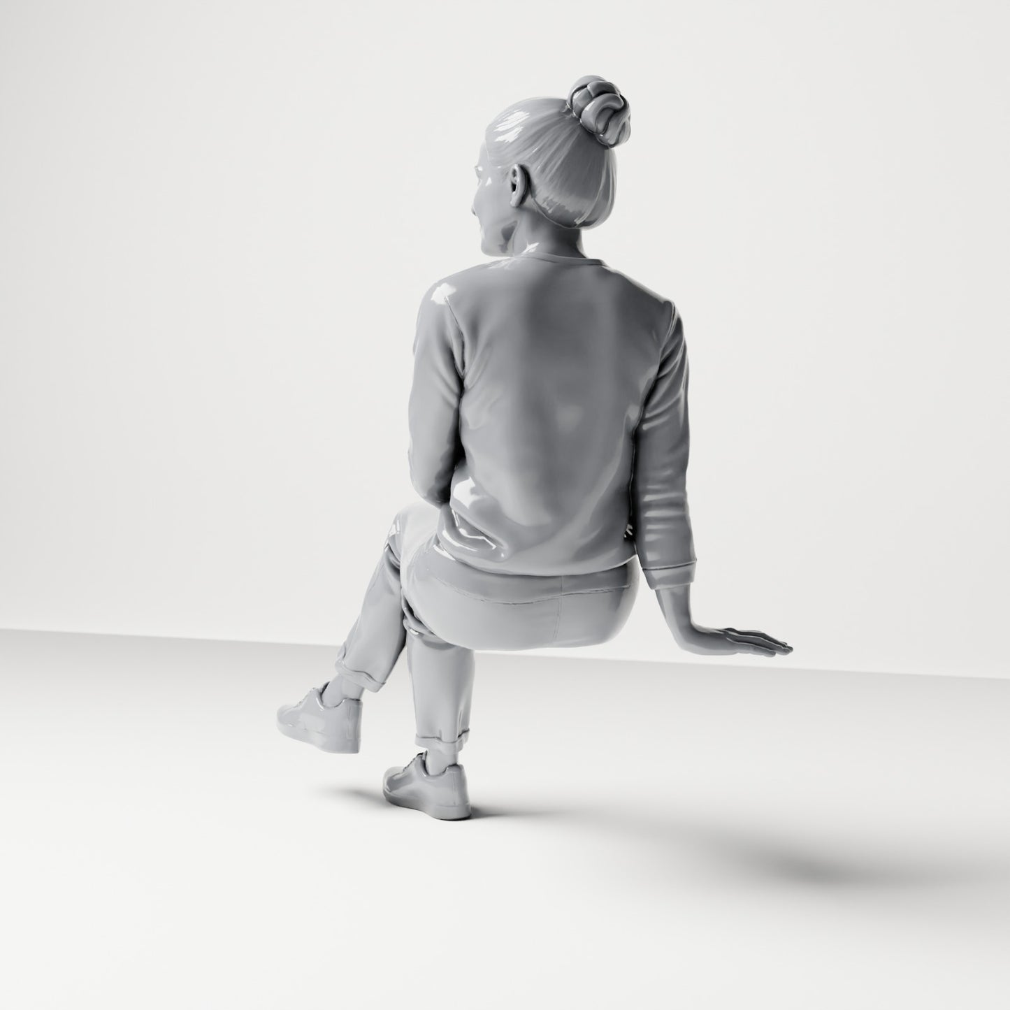 Photo produit de modélisme pour diorama 2 : figurine assise, spectatrice aux jambes croisées et aux mains sur les genoux (B055)