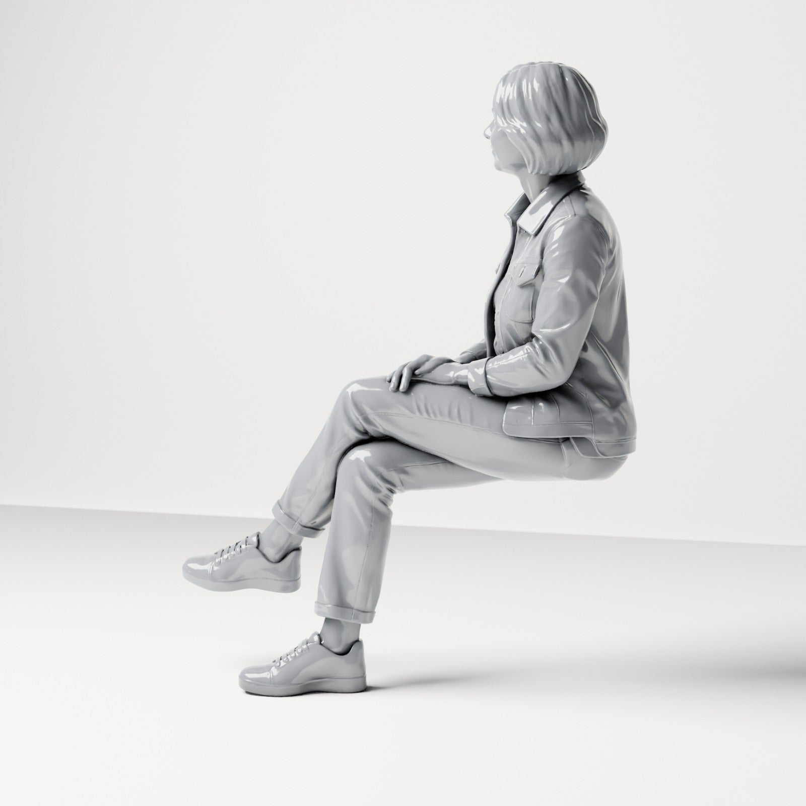 Photo produit de modélisme pour diorama 1 : figurine assise : spectatrice aux jambes croisées et aux mains sur le genou (B056)