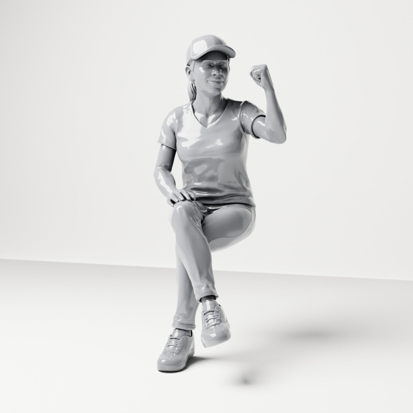 Photo produit de modélisme pour diorama 0 : figurine assise, spectatrice aux jambes croisées et au poing levé (B057)