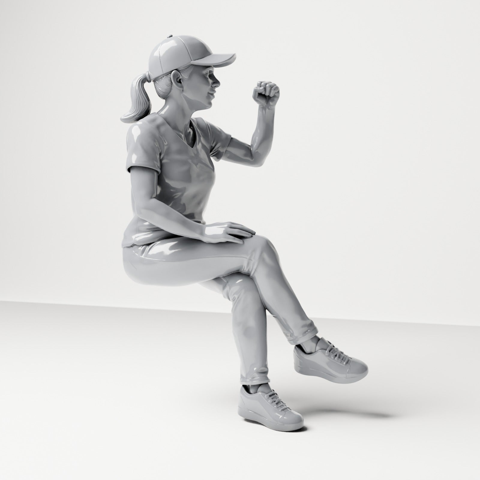 Photo produit de modélisme pour diorama 3 : figurine assise : spectatrice aux jambes croisées et au poing levé (B057)