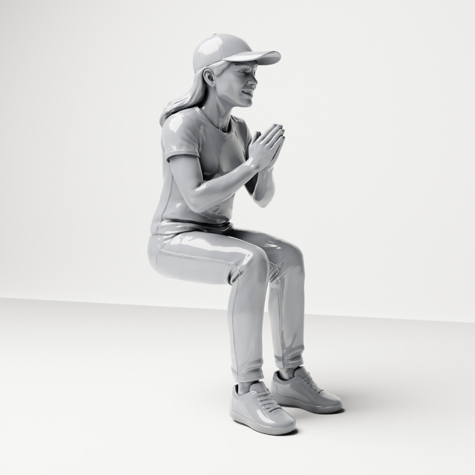 Photo produit de modélisme pour diorama 3 : figurine assise : spectatrice, mains jointes devant la poitrine (B058)