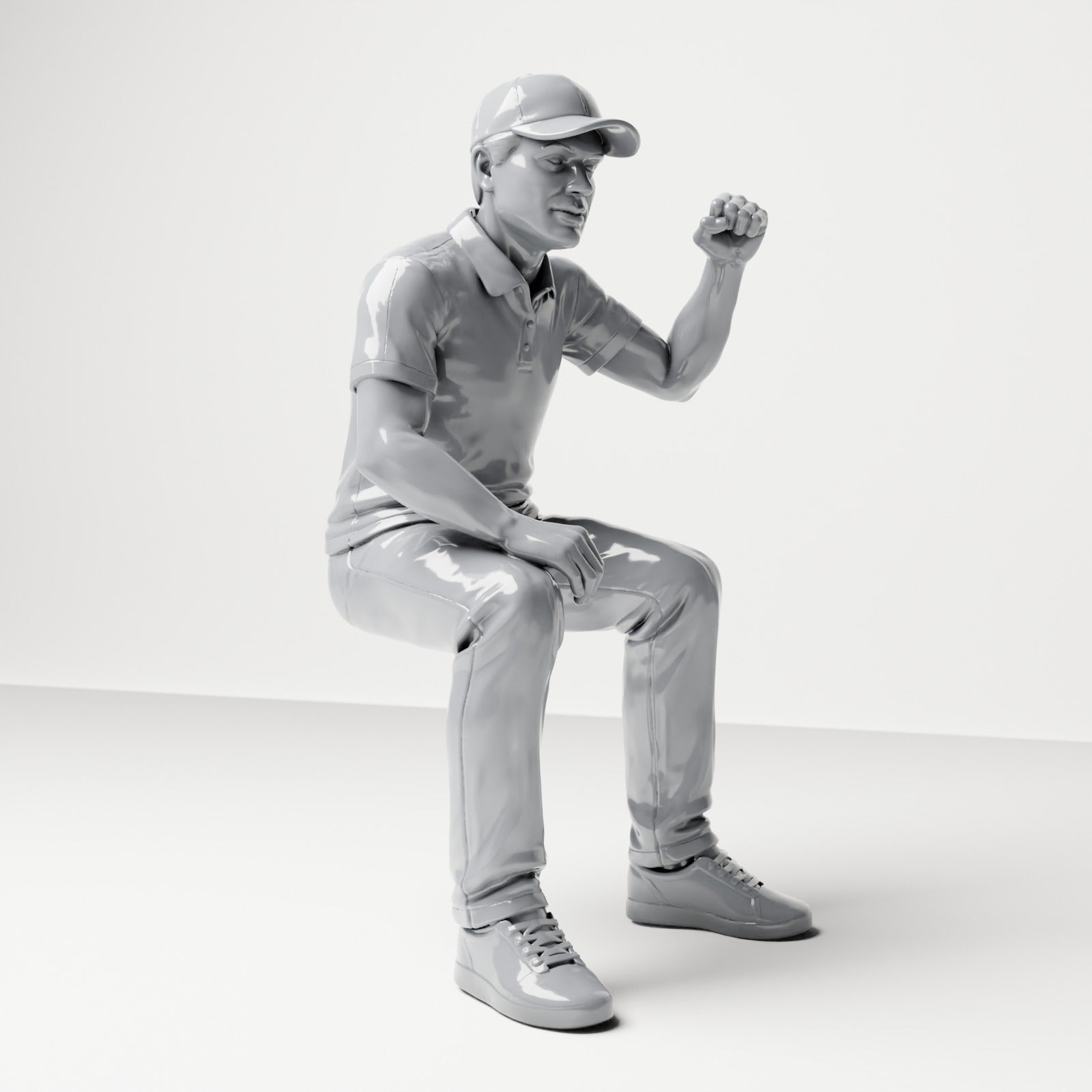 Photo produit de modélisme pour diorama 3 : figurine assise, spectateur masculin levant le poing serré (B065)