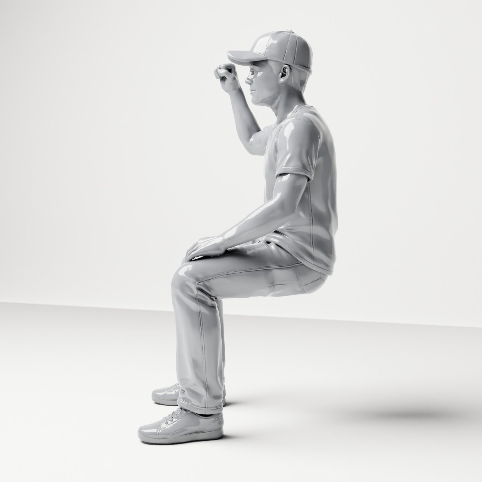 Photo produit de modélisme pour diorama 1 : figurine assise : spectateur levant le poing fermé (B066)