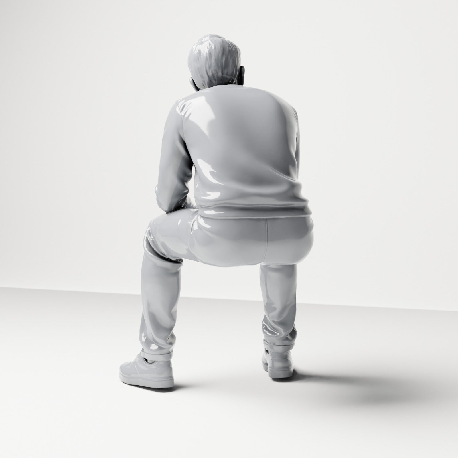 Photo produit de modélisme pour diorama 2 : figurine assise : spectateur masculin aux mains jointes (B067)
