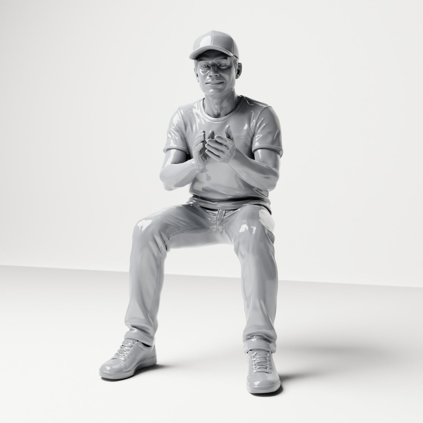 Photo produit de modélisme pour diorama 0 : figurine assise : spectateur masculin avec casquette et mains jointes (B068)