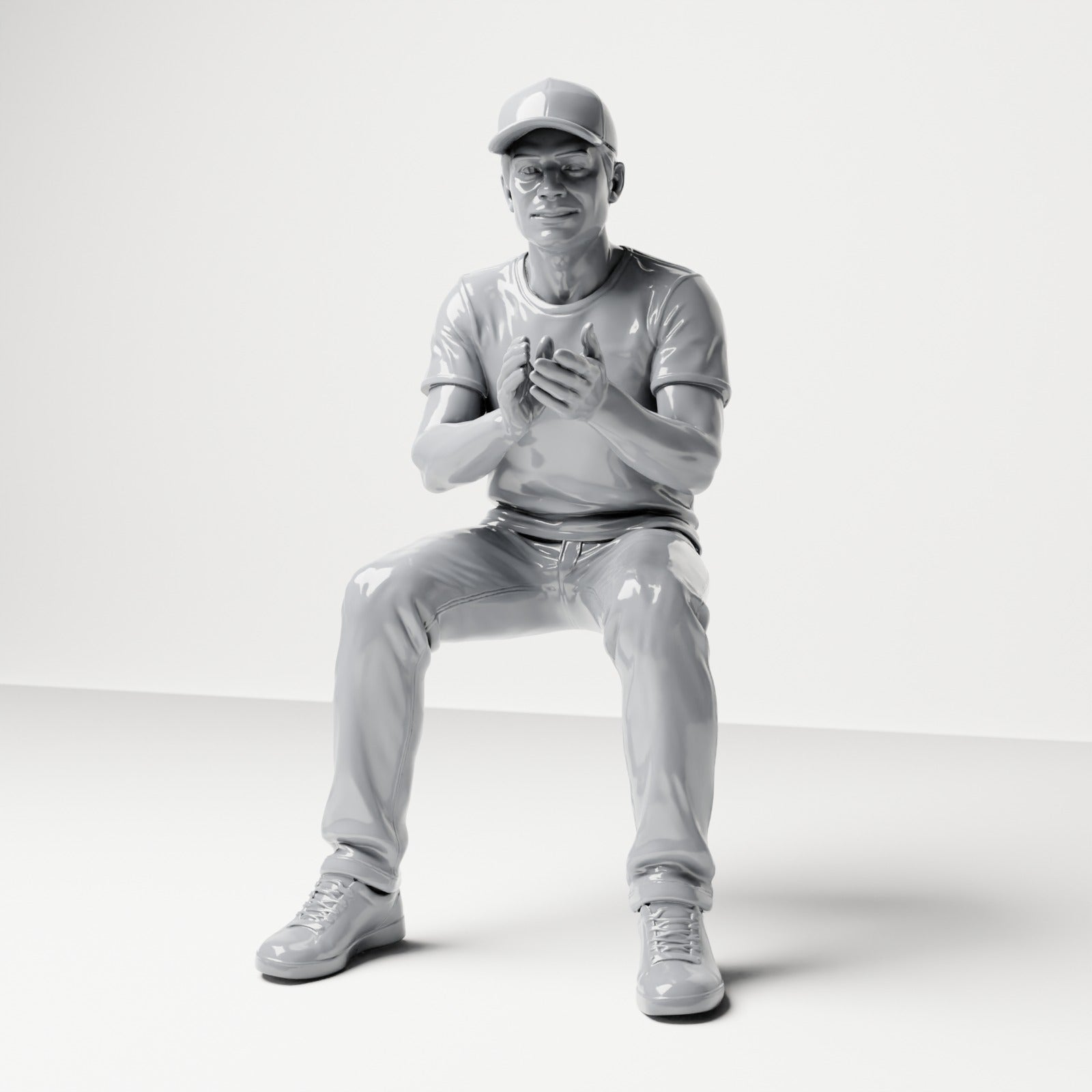 Photo produit de modélisme pour diorama 0 : figurine assise : spectateur masculin avec casquette et mains jointes (B068)