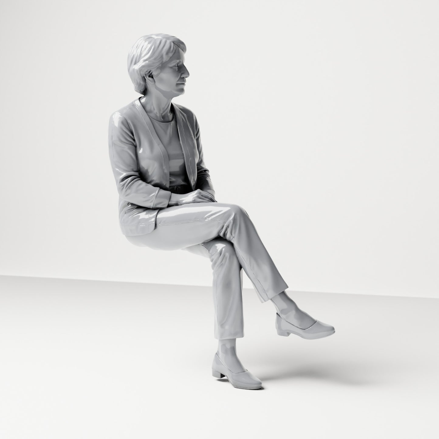 Photo produit de diorama : figurine assise, spectatrice aux jambes croisées et aux mains jointes (B069)