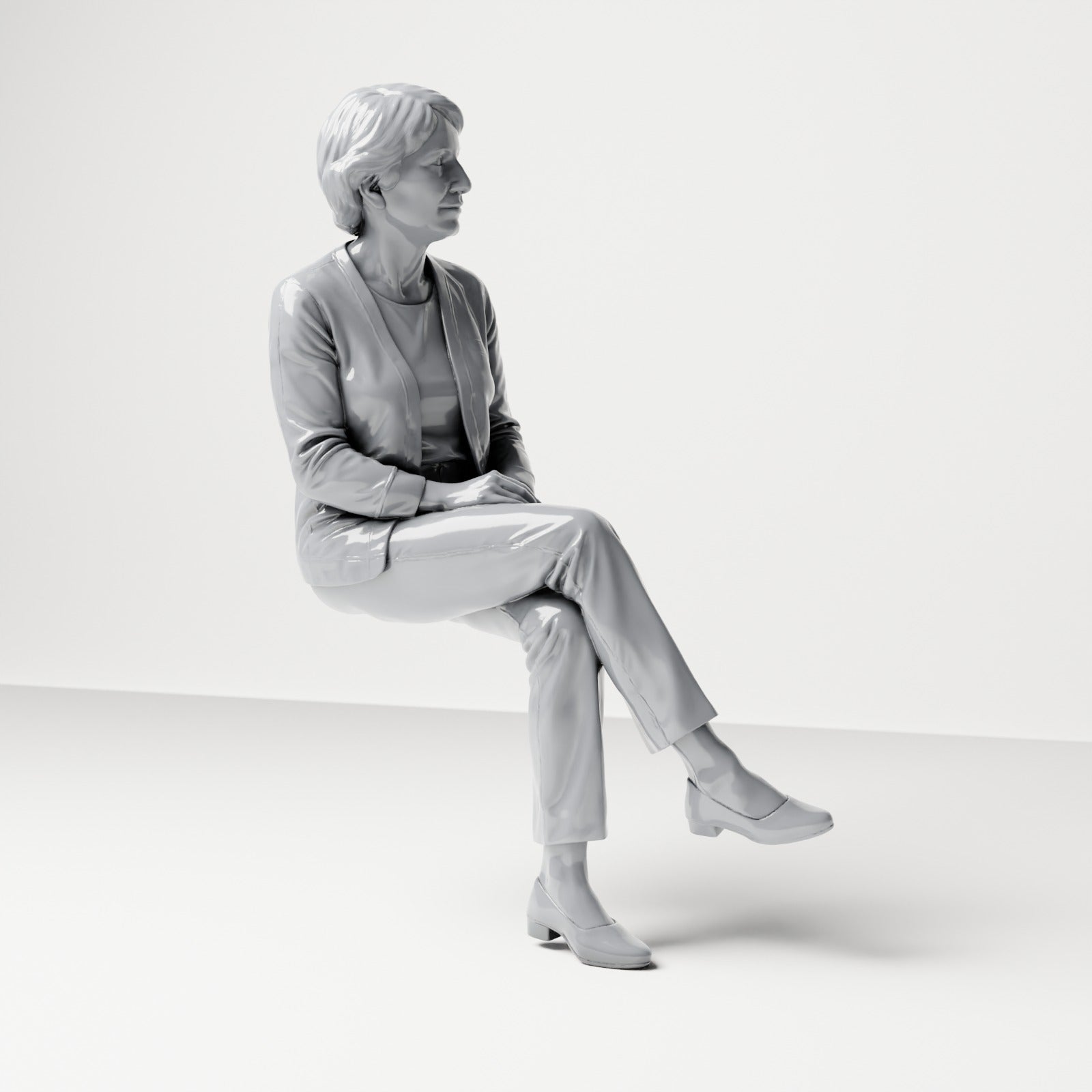 Photo produit de diorama : figurine assise, spectatrice aux jambes croisées et aux mains jointes (B069)