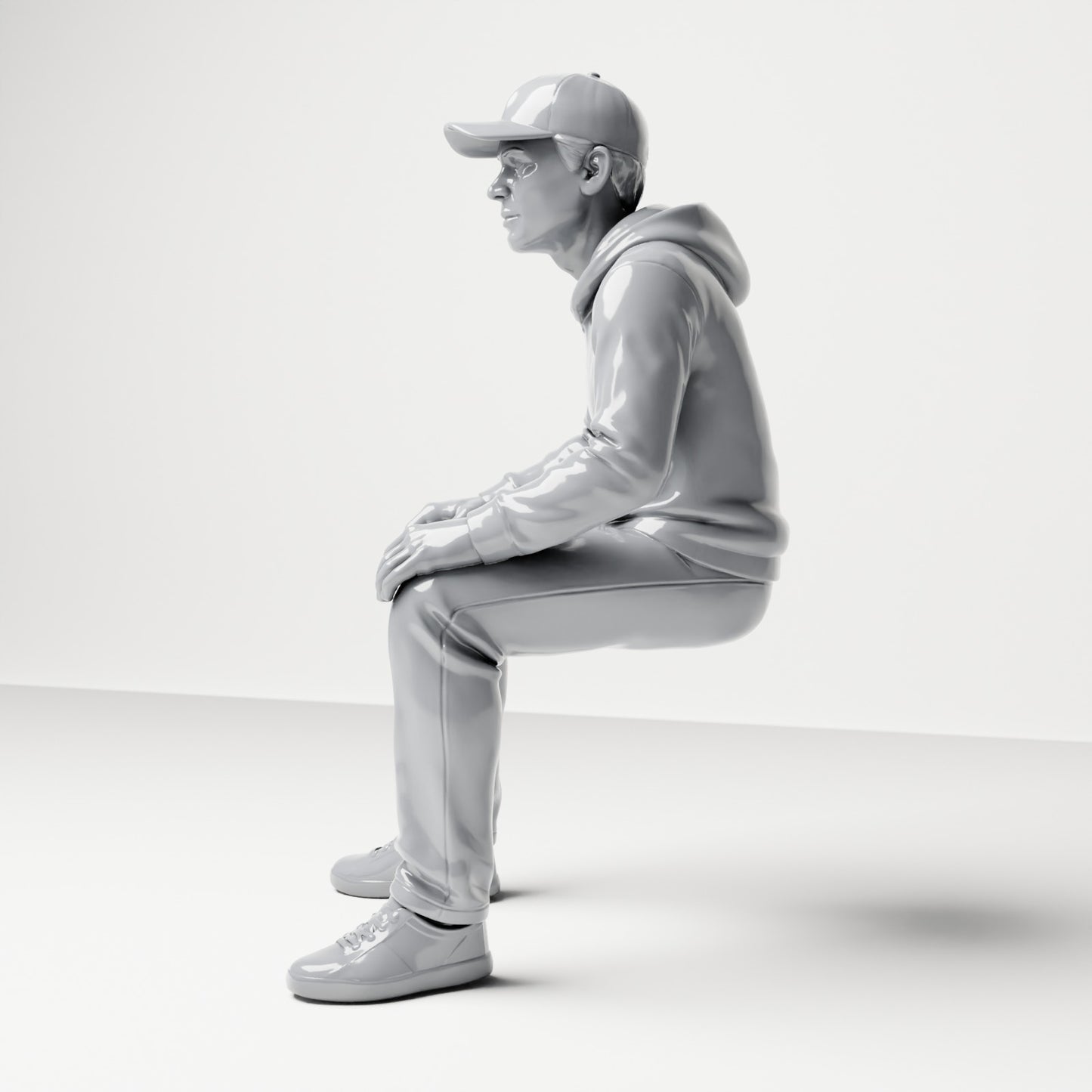 Photo produit de modélisme de diorama 1 : figurine assise : homme avec casquette et sweat à capuche (B070)