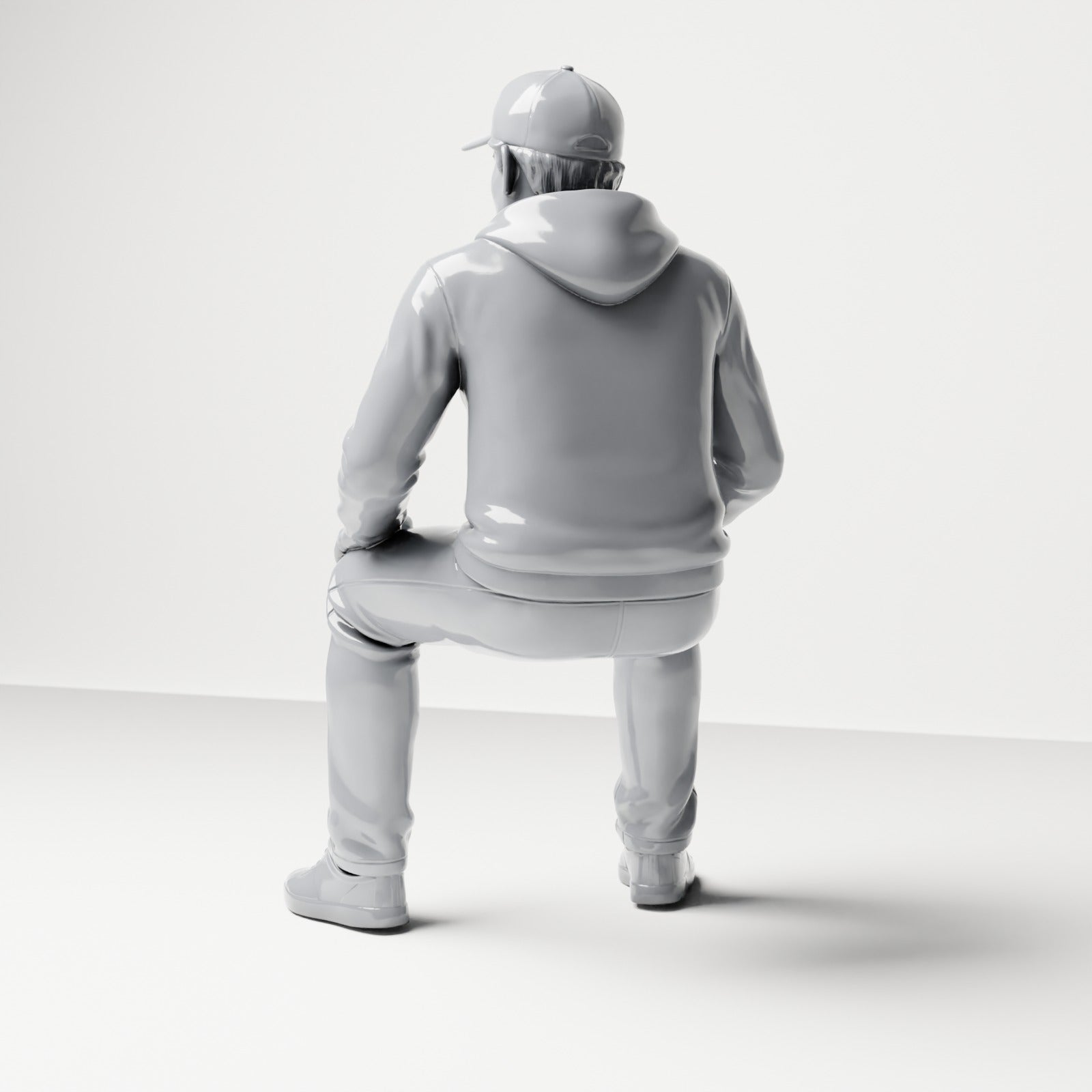 Photo produit de modélisme de diorama 2 : figurine assise : homme avec casquette et sweat à capuche (B070)