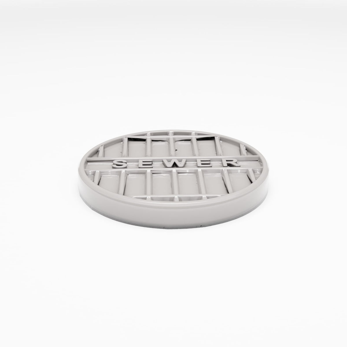 Photo produit pour diorama et modélisme 0 : Diorama de rue : Tampon de regard en fonte « SEWER » (Ref. 1042D)