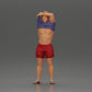 Diorama modélisme photo produit 0 : Figurine debout : homme musclé en short tirant un T-shirt par-dessus la tête (Ref Nr. A90)