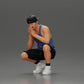 Diorama modélisme photo produit 0 : Miniature diorama : Homme pensif accroupi avec une casquette, un short et des baskets (Ref Nr. A77)