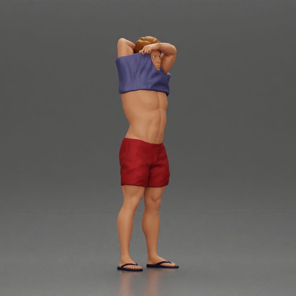 Diorama modélisme photo produit 1 : Miniature debout : homme musclé en short tirant un T-shirt par-dessus la tête (Ref Nr. A90)