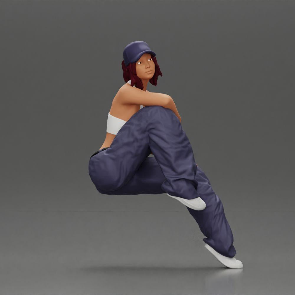 Diorama modélisme photo produit 1 : Figurine miniature : Femme lowrider assise avec casquette, bras sur le genou, débardeur et baskets (Ref Nr. A138)