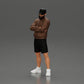 Diorama modélisme photo produit 5 : Figurine : homme les bras croisés, casquette, veste, shorts, chaussures de sport (Ref Nr. A125)