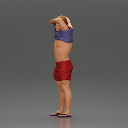 Diorama modélisme photo de produit 5 : Miniature debout : homme musclé en short mettant un T-shirt par-dessus la tête (Ref Nr. A90)
