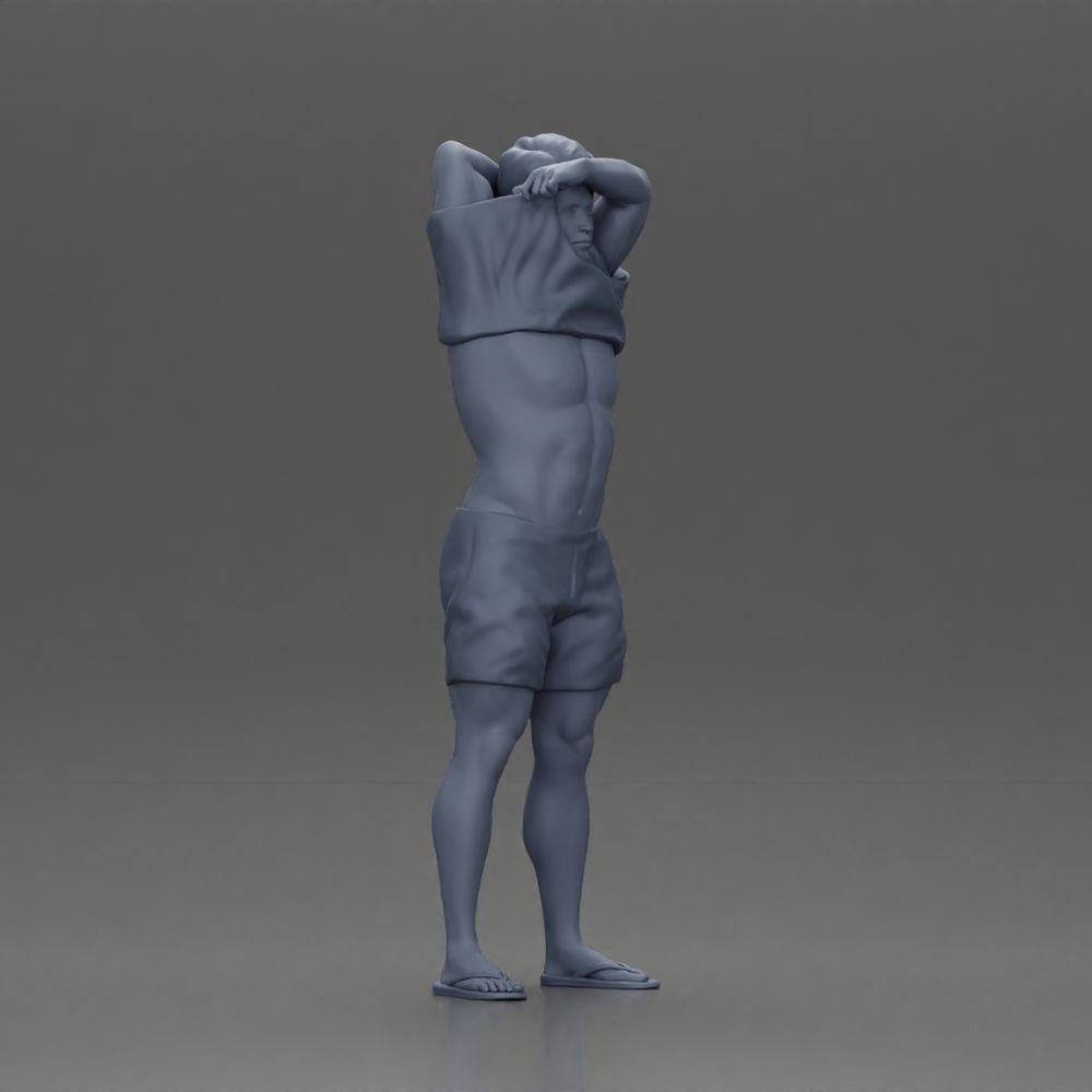 Diorama modélisme photo de produit 7 : Miniature debout : homme musclé en shorts tirant un T-shirt sur la tête (Ref Nr. A90)