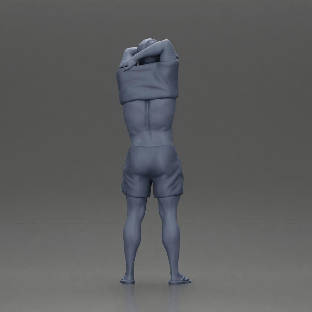 Diorama modélisme photo de produit 9 : Miniature debout : homme musclé en short mettant un T-shirt sur sa tête (Ref Nr. A90)