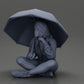 Diorama Modélisme Photo de produit 11 : Miniature de diorama : Femme assise en veste et short avec un parapluie ouvert (Ref Nr. A85)