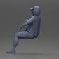 Diorama Modélisme Photo de produit 11 : Miniature : Femme jeune assise sur une chaise, jambe repliée, buvant dans une tasse (Ref Nr. A57)