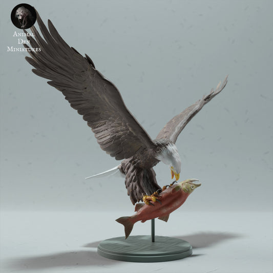 Photo du produit, figurine animale Animal Den Miniatures 0 : figurine d’animal sauvage : pygargue à tête blanche mangeant un saumon (23_01_14)