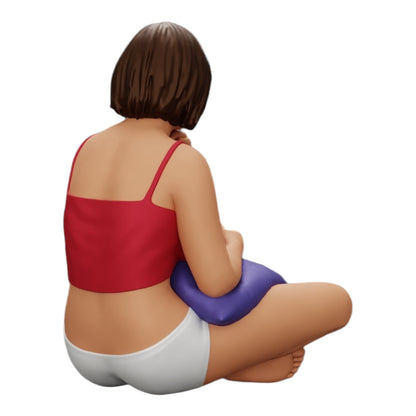 Diorama modélisme photo produit 0 : Fille assise devant la télévision avec des coussins sur les jambes (Réf n° A36)