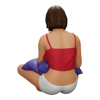 Diorama modélisme photo produit 0 : Fille assise devant la télévision avec des coussins sur les jambes (Réf n° A36)