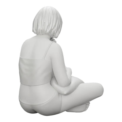 Diorama modélisme photo produit 0 : Fille assise devant la télévision avec des coussins sur les jambes (Réf n° A36)