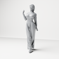 Diorama Modellbau Produktfoto 1: Stehende Figur: Frau mit bauchfreiem Rollkragenoberteil & weiter Hose (a167)