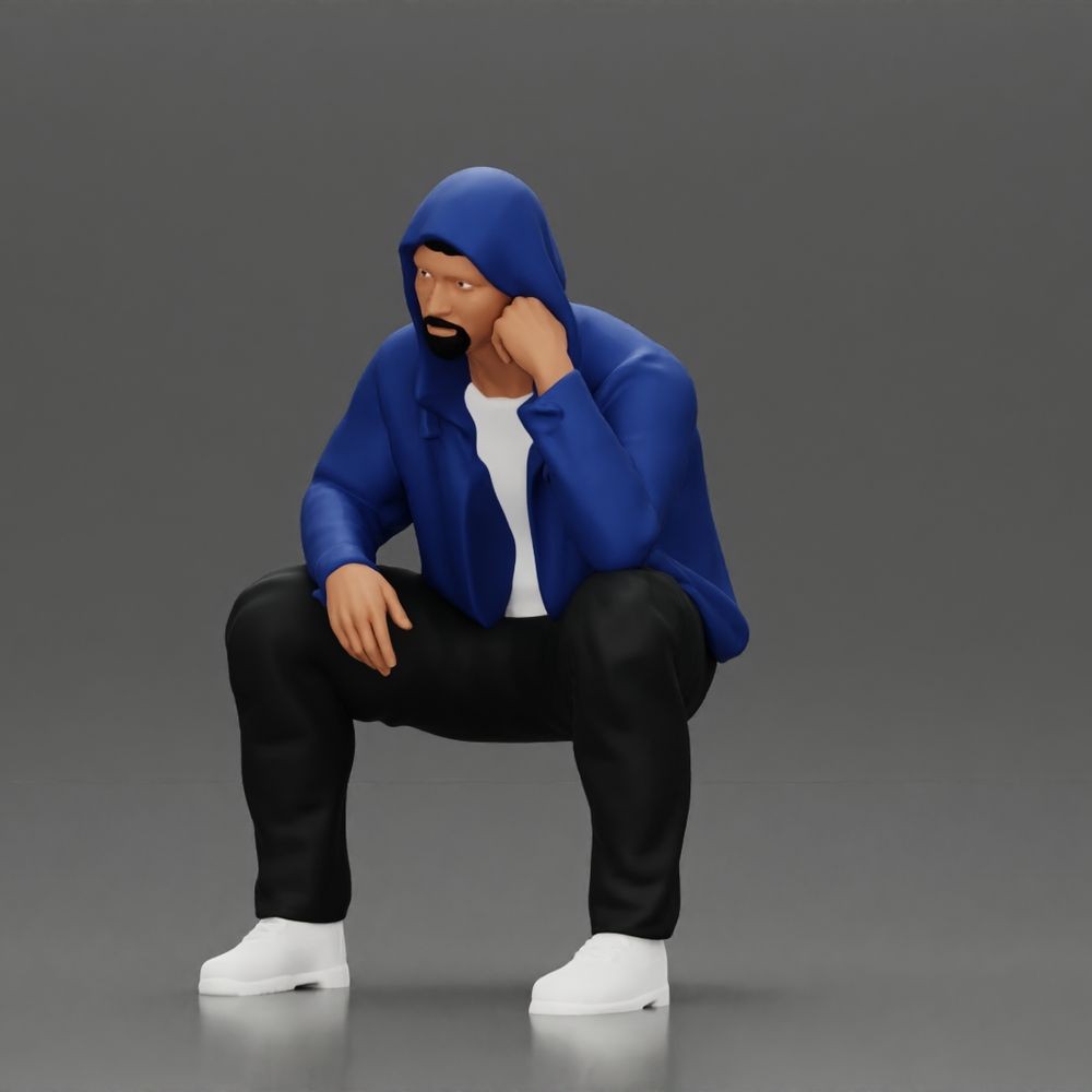 Photo produit de modélisme pour diorama 2 : figurine agenouillée, homme accroupi avec veste à capuche et main sur le visage (a163)