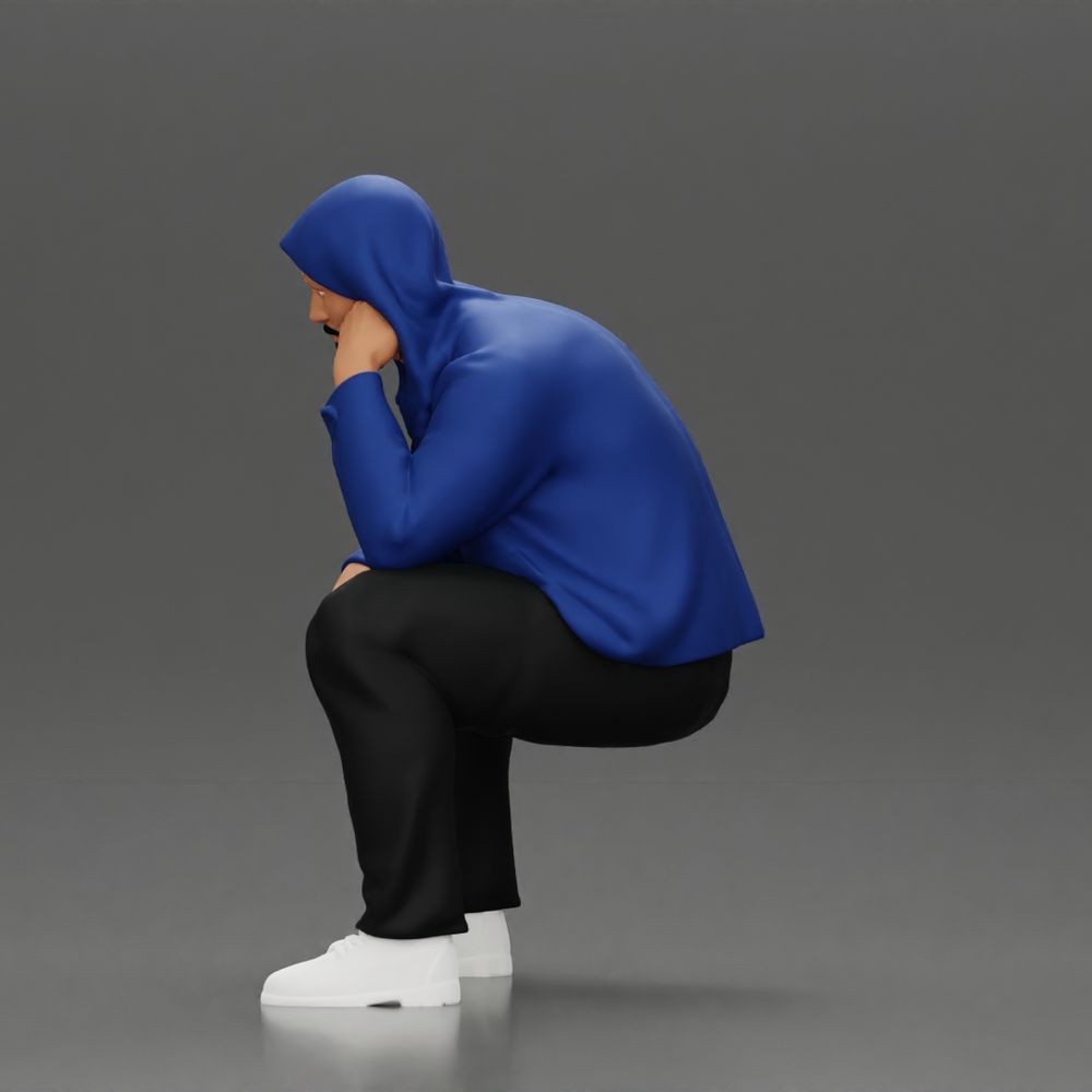 Photo produit de modélisme pour diorama 3 : figurine agenouillée : homme accroupi avec veste à capuche et main sur le visage (a163)
