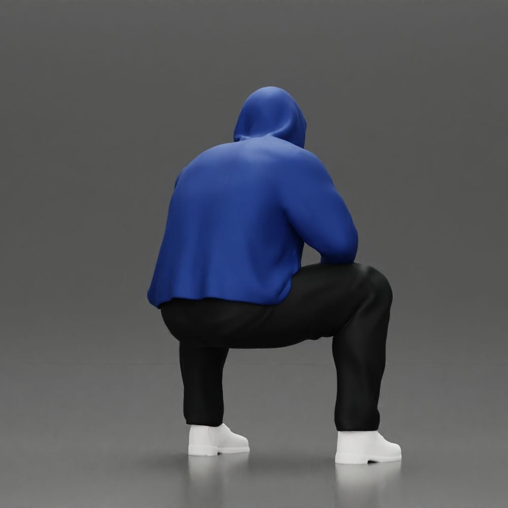 Photo produit de modélisme pour diorama 4 : figurine agenouillée : homme accroupi avec veste à capuche et main sur le visage (a163)