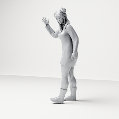 Photo produit de modélisme pour diorama 6 : figurine debout : femme faisant signe à un taxi, portant une robe à manches longues et des bottes (a204)