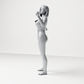 Diorama Modellbau Produktfoto 6: Stehende Figur: Frau im einteiligen Bodysuit mit ausgestreckten Armen (a206)