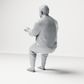 Photo produit de modélisme de diorama 9 : Figurine assise : homme gesticulant avec pull, pantalon et tongs (a165)