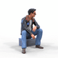 Photo du produit Diorama et modélisme Figurine miniature : Homme en cuir et lunettes de soleil assis
